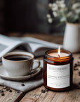 Caramel Macchiato soy candle styled in cozy kitchen setting with roasted coffee beans and coffee cup