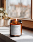 Golden Mandarin soy candle in warm sunlit setting