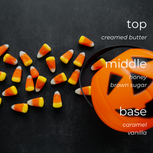 Load image into Gallery viewer, candy corn candle with buttery caramel and vanilla aroma