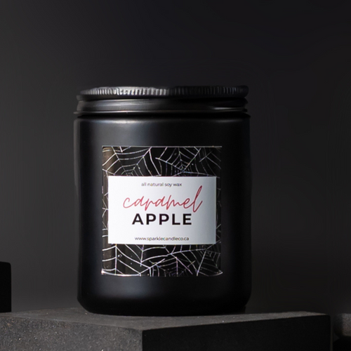 Caramel Apple candle in a black jar, hand-poured with warm autumn notes of crisp apple, caramel, apple cider and sugar