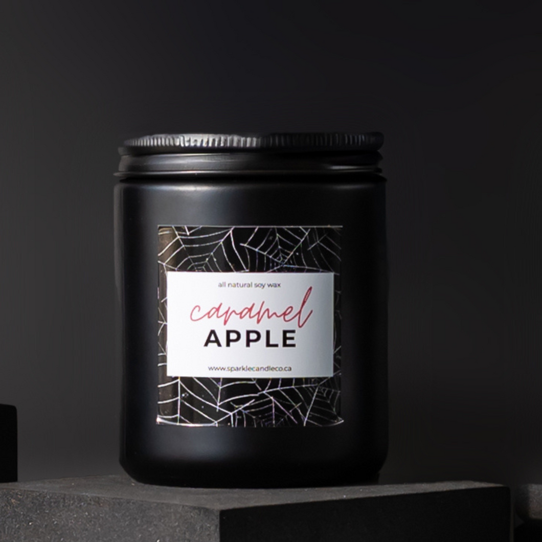 Caramel Apple candle in a black jar, hand-poured with warm autumn notes of crisp apple, caramel, apple cider and sugar