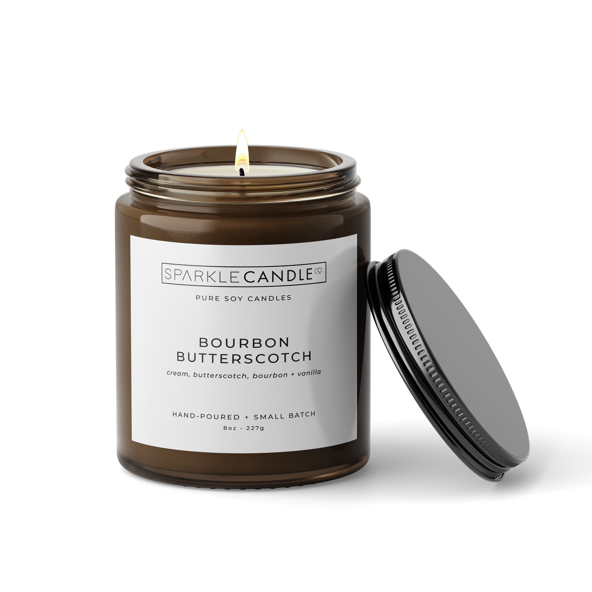 Bourbon Butterscotch soy candle in amber jar with black lid