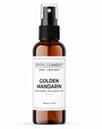 Golden Mandarin room and linen spray in an amber spray bottle