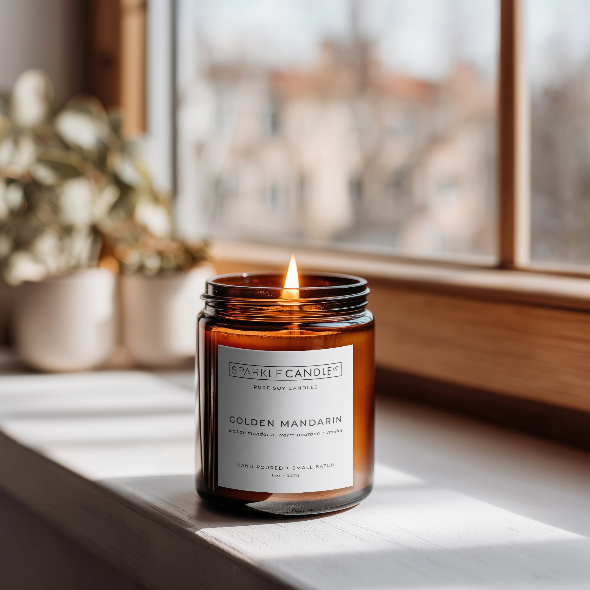 Golden Mandarin soy candle in warm sunlit setting