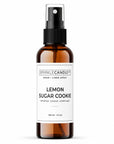 Brown spray bottle labeled 'Lemon Sugar Cookie' by Sparkle Candle on a white background