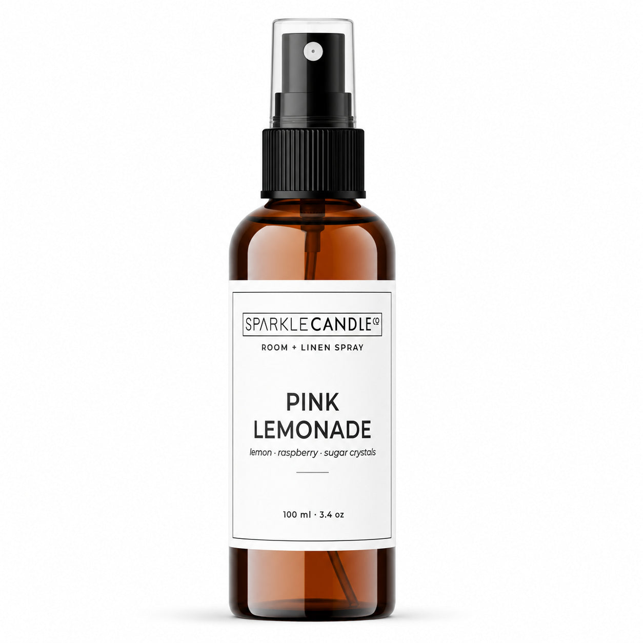 Brown spray bottle labeled 'Pink Lemonade' by Sparkle Candle on a white background